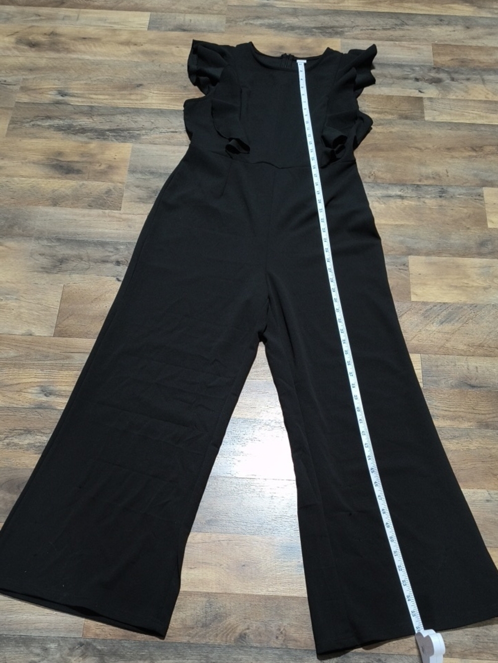 Black Ruffle-Sleeve Wide-Leg Jumpsuit - Classic Women's Romper